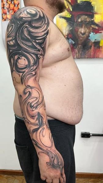 Abstract blackwork abstract swirls tattoo by @skazxim