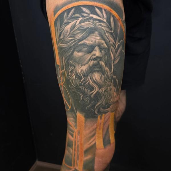 Realism greek god portrait tattoo by @vividinkbirmingham