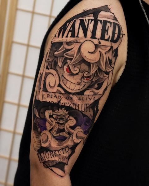 Anime luffy wanted poster tattoo by @vitoortattoo