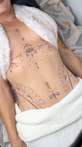 Ornamental ornamental lotus tattoo by @vivi_b_tattoo