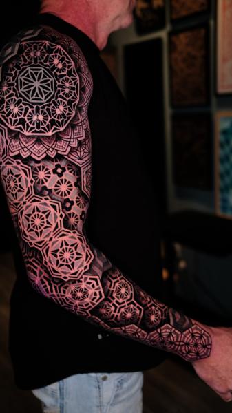 Geometric geometric sleeve tattoo by @weschetattoo