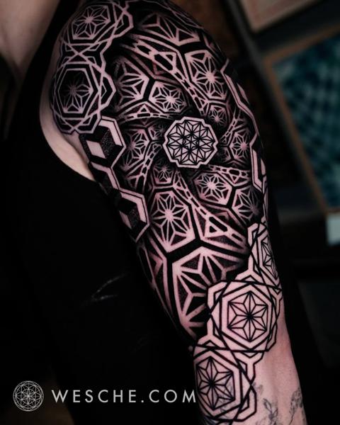 Blackwork geometric pattern tattoo by @weschetattoo