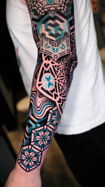 Geometric geometric pattern tattoo by @weschetattoo