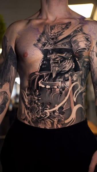 Realism samurai mask tattoo by @wilkendorftattoo