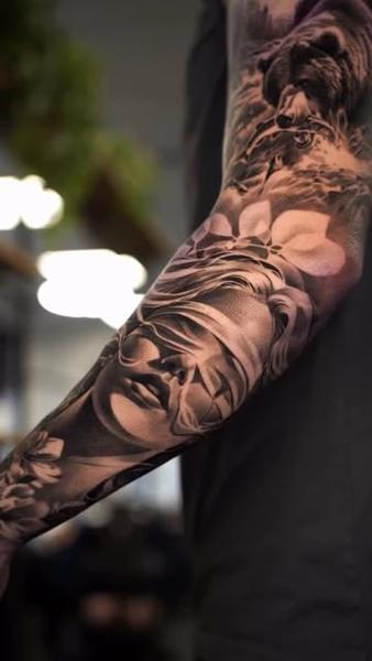 Realism blindfolded woman bear tattoo by @wilkendorftattoo