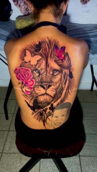 Realism lion portrait butterflies tattoo by @willians_tattoo