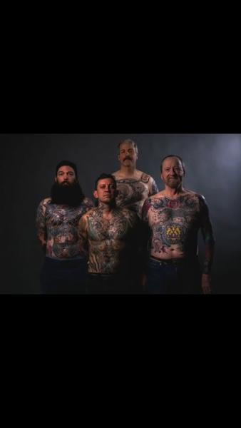 Traditional various chest designs tattoo by @wolfslayertattoos