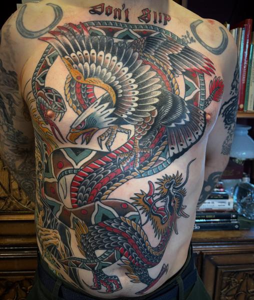 Traditional eagle and snake tattoo by @wolfslayertattoos