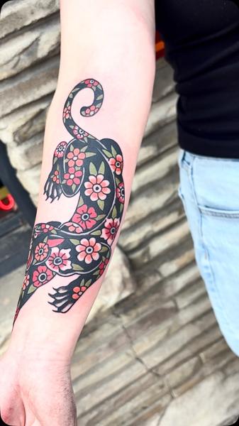 Traditional floral lizard tattoo by @wolfslayertattoos