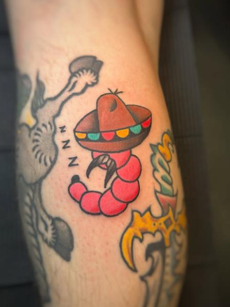 Traditional sombrero worm tattoo by @elpincheloco
