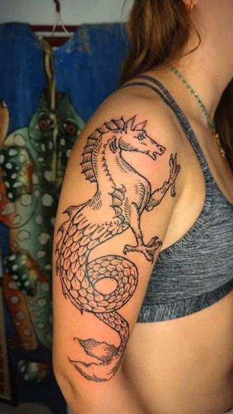 Linework dragon tattoo by @art.of.gold