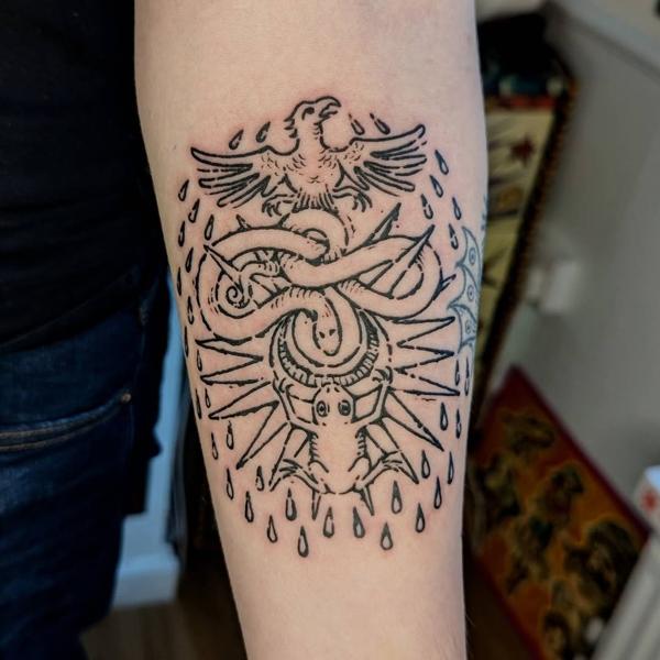 Linework eagle and snake tattoo by @art.of.gold