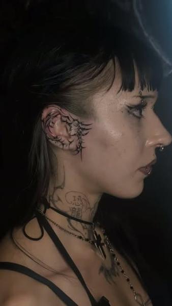 Fine line winged ear tattoo by @grit_ur_teeth