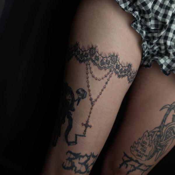 Fine line lace garter tattoo by @grit_ur_teeth