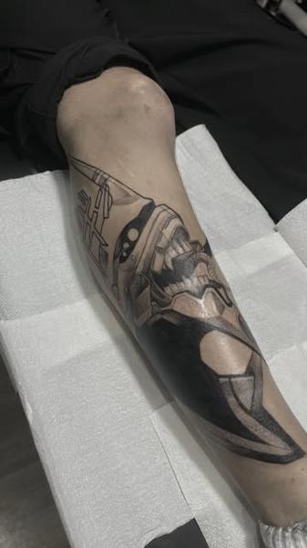 Anime mecha head tattoo by @yasart.tattoo