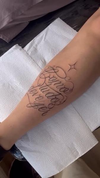 Script script lettering tattoo by @yasart.tattoo