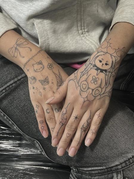 Fine line distressed plush toy tattoo by @yasart.tattoo