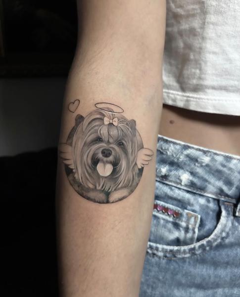 Realism angel dog portrait tattoo by @yolandaorlandi