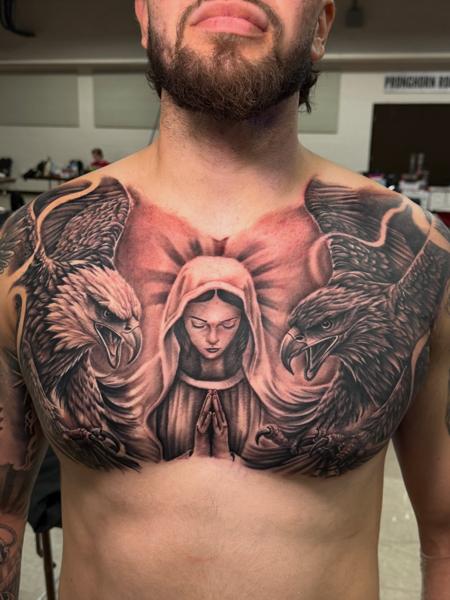 Realism praying figure with eagles tattoo by @zamor_art
