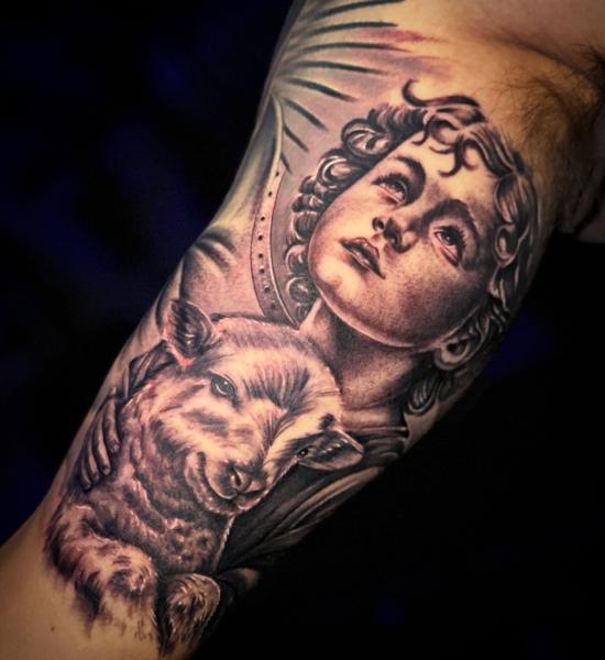 Realism angel and lamb tattoo by @zamor_art