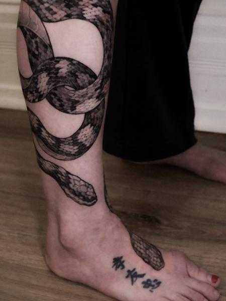 Realism snake tattoo by @zozutattoo