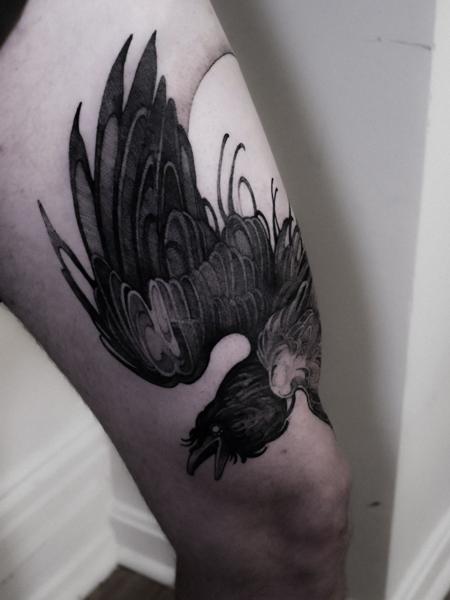 Blackwork flying crow tattoo by @zozutattoo